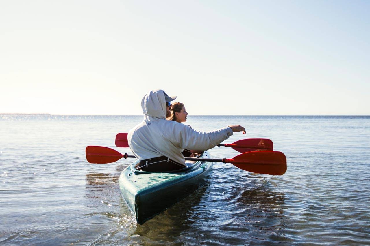 A couple paddling while on a kayaking tour in Key West, Florida